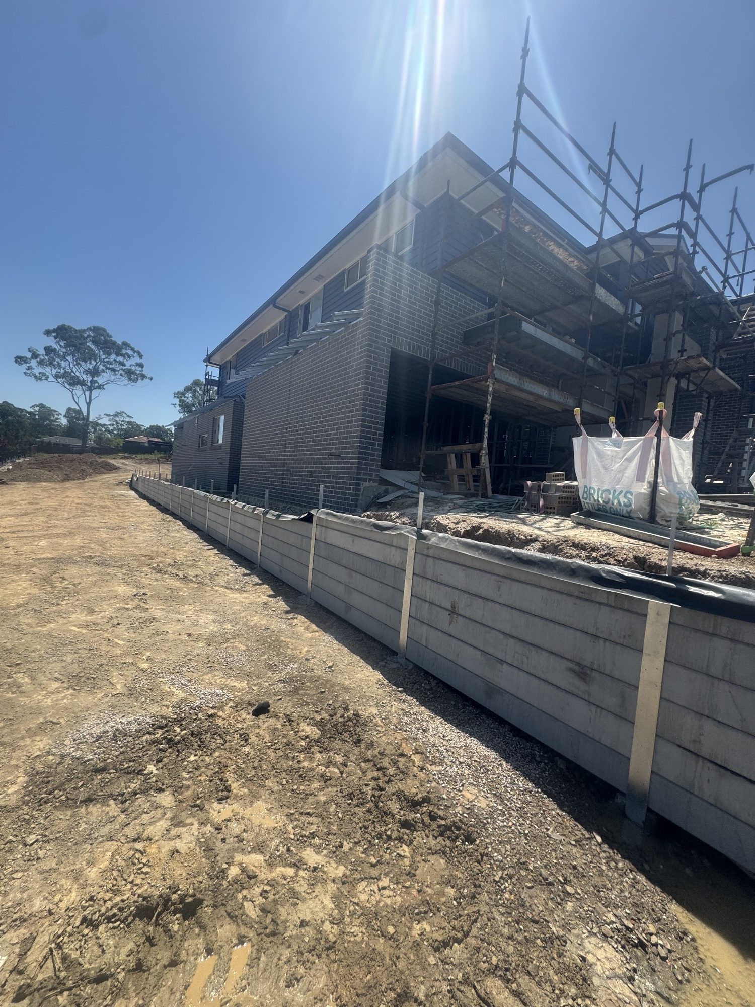 Timber retaining wall completed